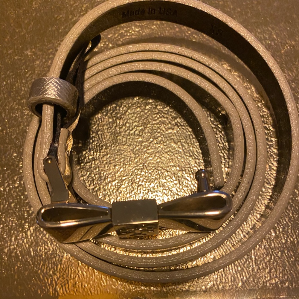 Tory Burch skinny bow belt.